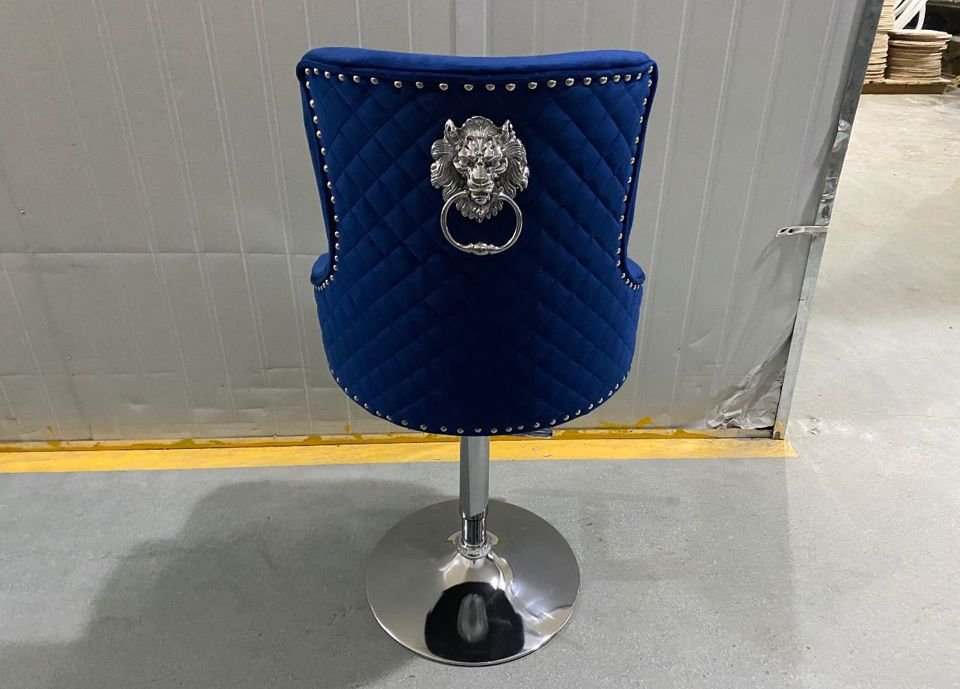 NAVY VELVET COUNTER HEIGHTS BAR STOOL WITH LION RING.